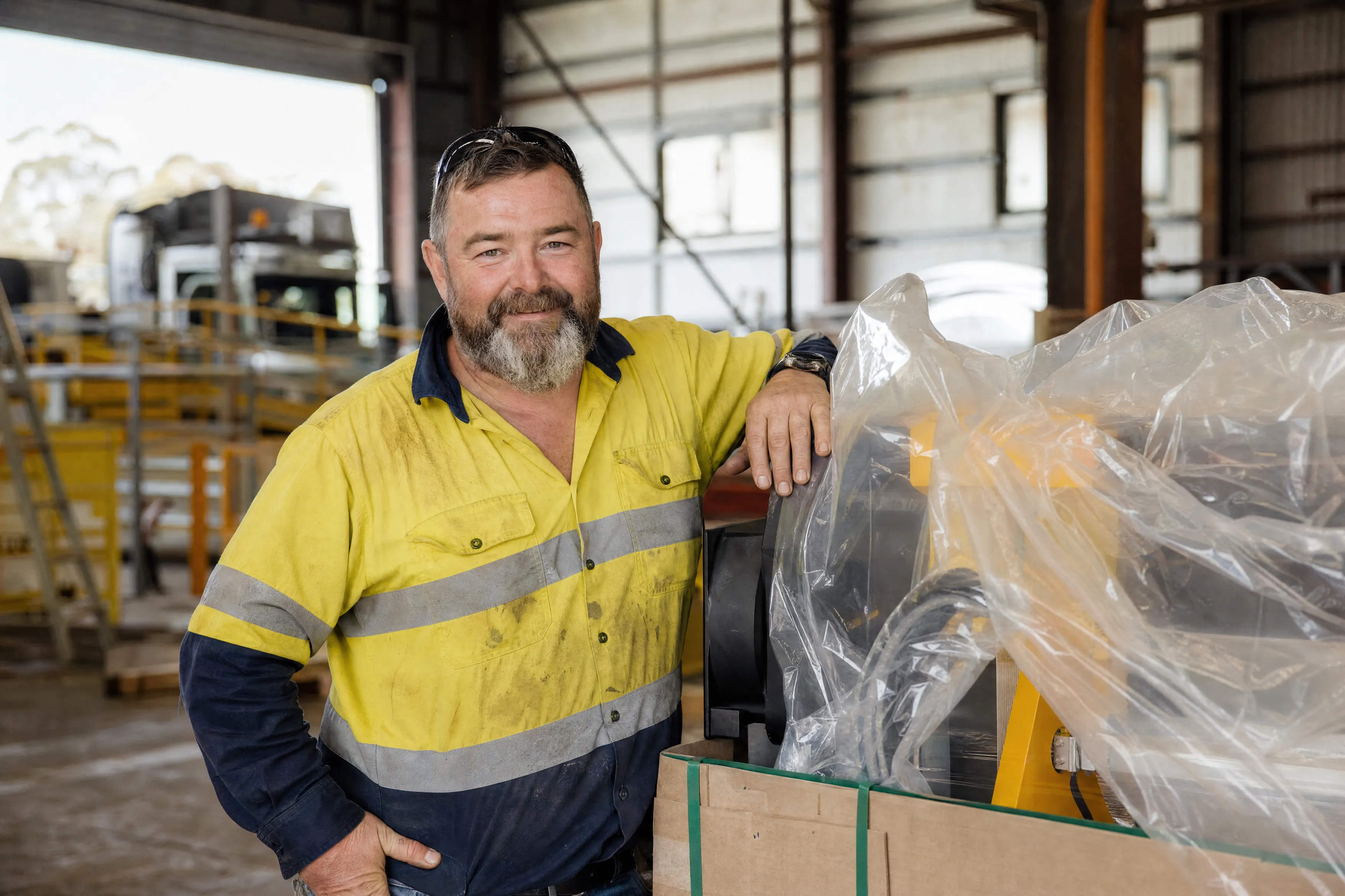 Tradie with newly financed equipment on site