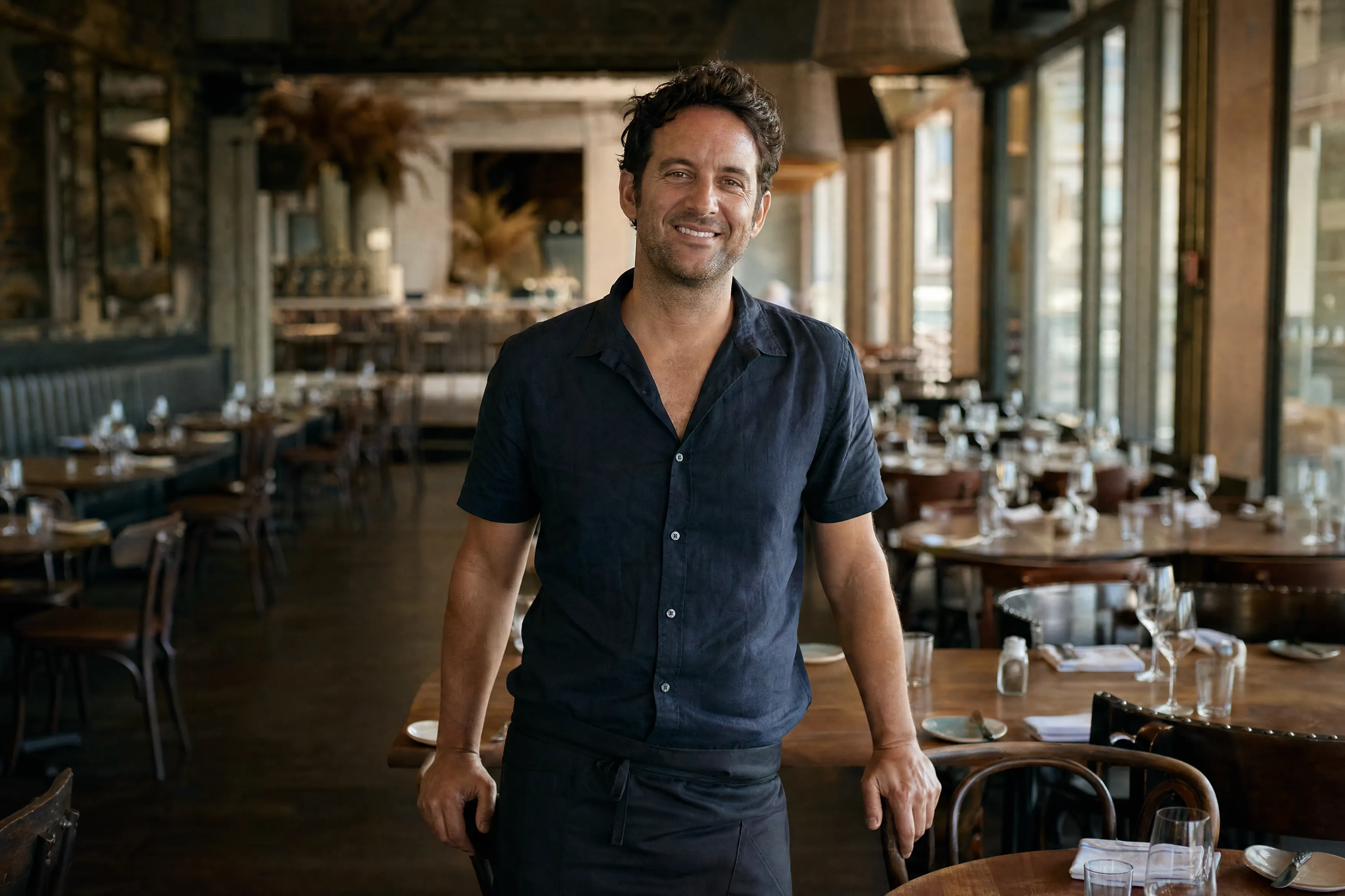 Gold Coast restaurateur in his dining room before service